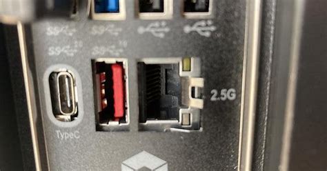 Metal tab from IO shield stuck in Ethernet port. Do I need to